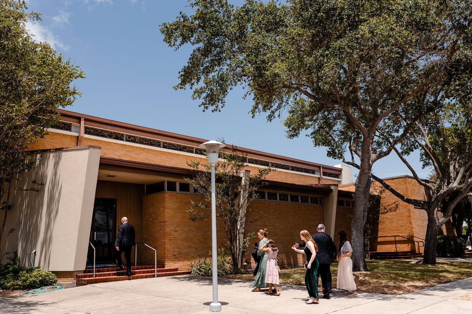 St. Patrick Catholic Church | Art Museum of South Texas Corpus Christi 16 a group of people outside a building