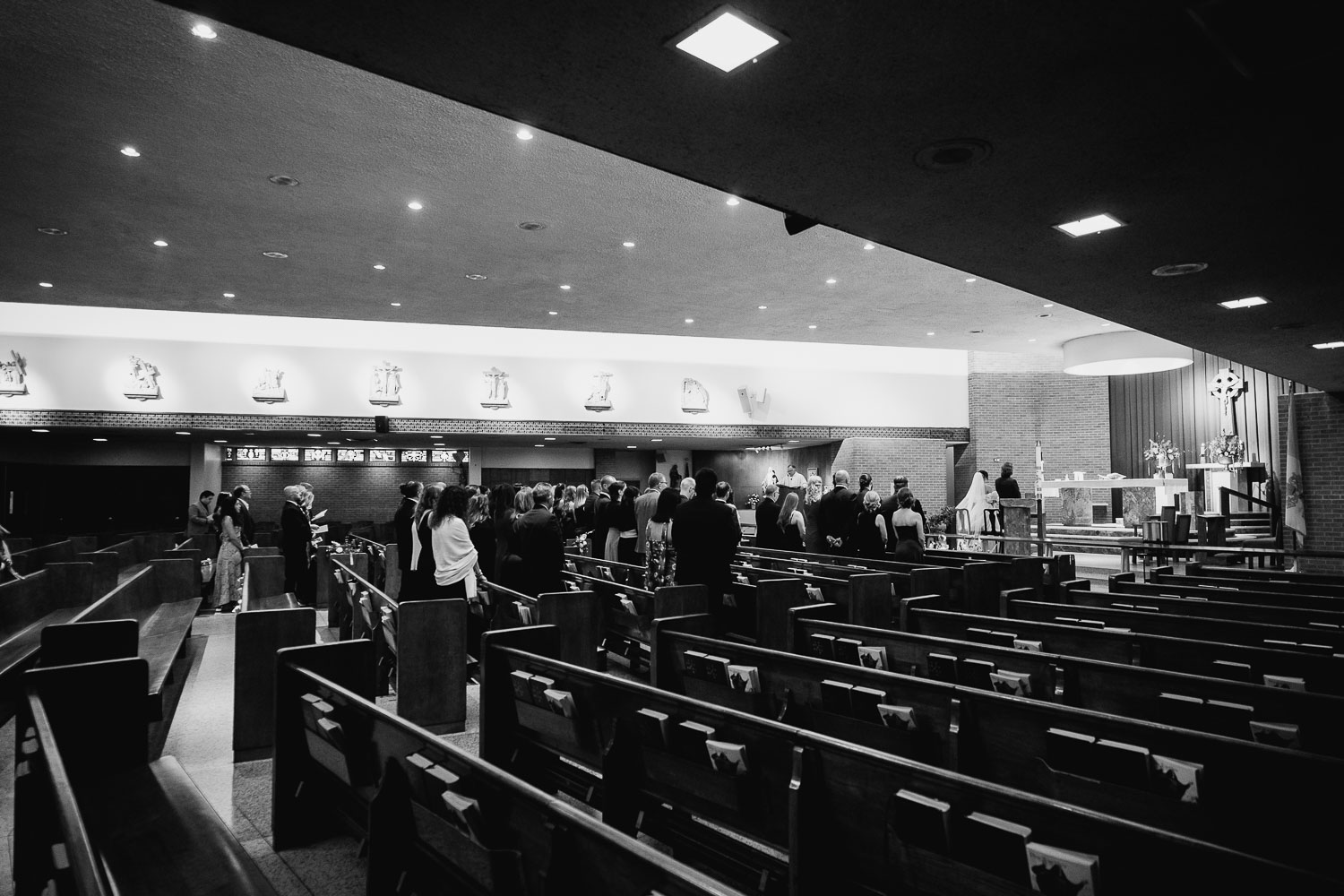 St. Patrick Catholic Church | Art Museum of South Texas Corpus Christi 22 a group of people in a church