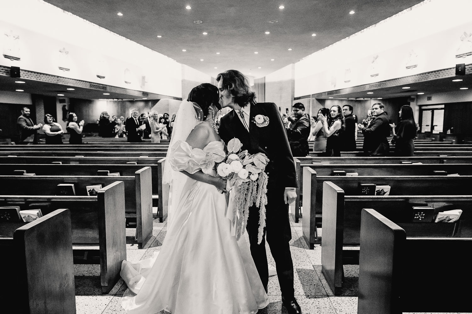 St. Patrick Catholic Church | Art Museum of South Texas Corpus Christi 24 a man and woman kissing in a church
