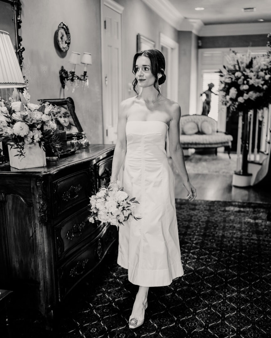 Elegant Houston Elopement | Caroline+George | Houston, Texas 25 Bride in white dress with bouquet.