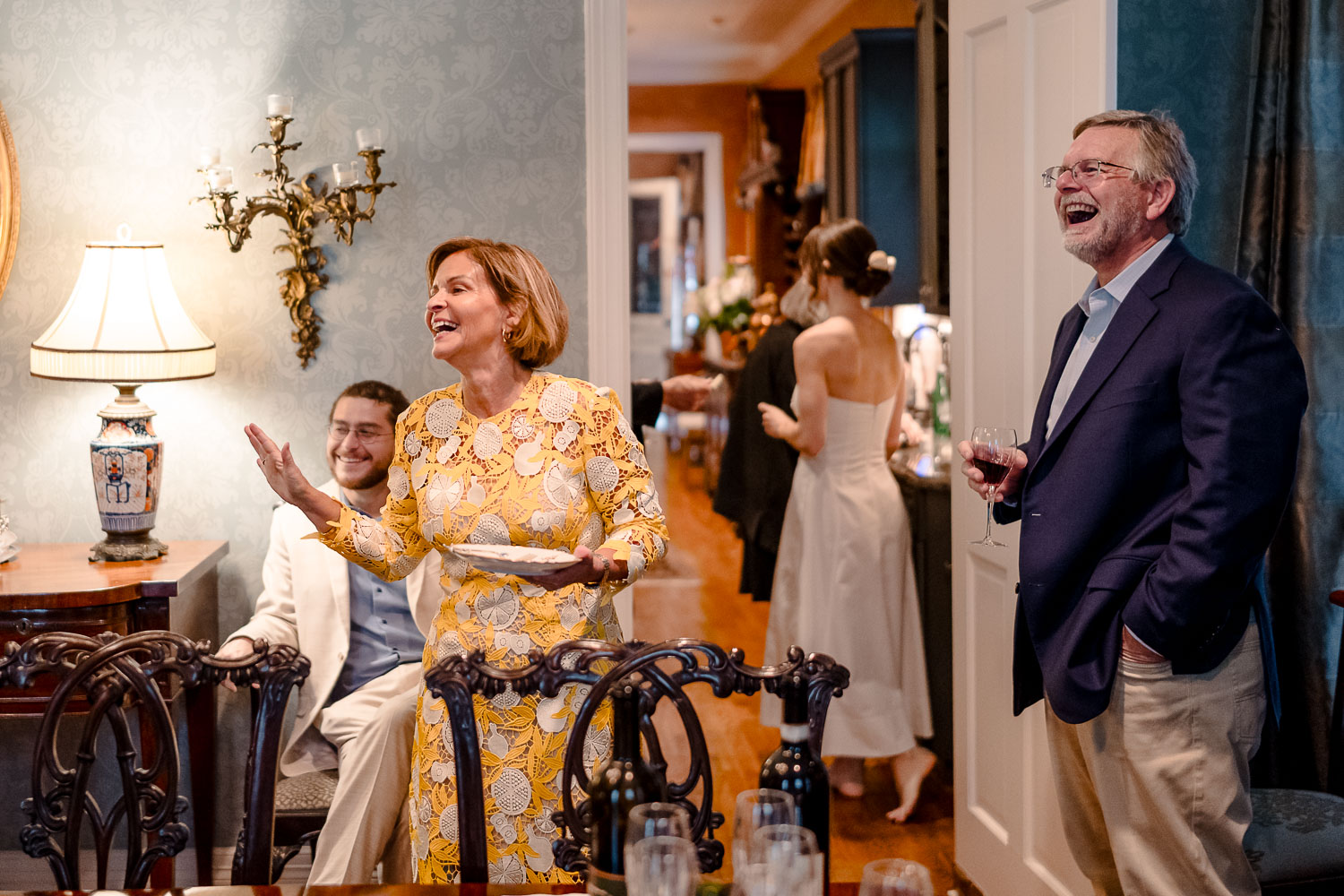 Elegant Houston Elopement | Caroline+George | Houston, Texas 35 Couple celebrating with wedding cake.