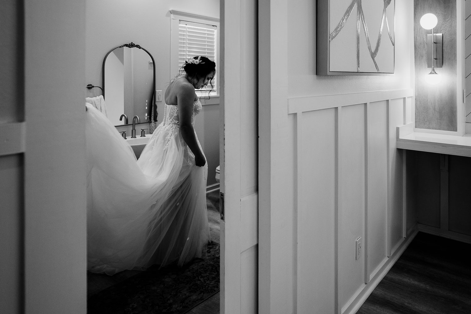 Bride preparing in elegant setting.