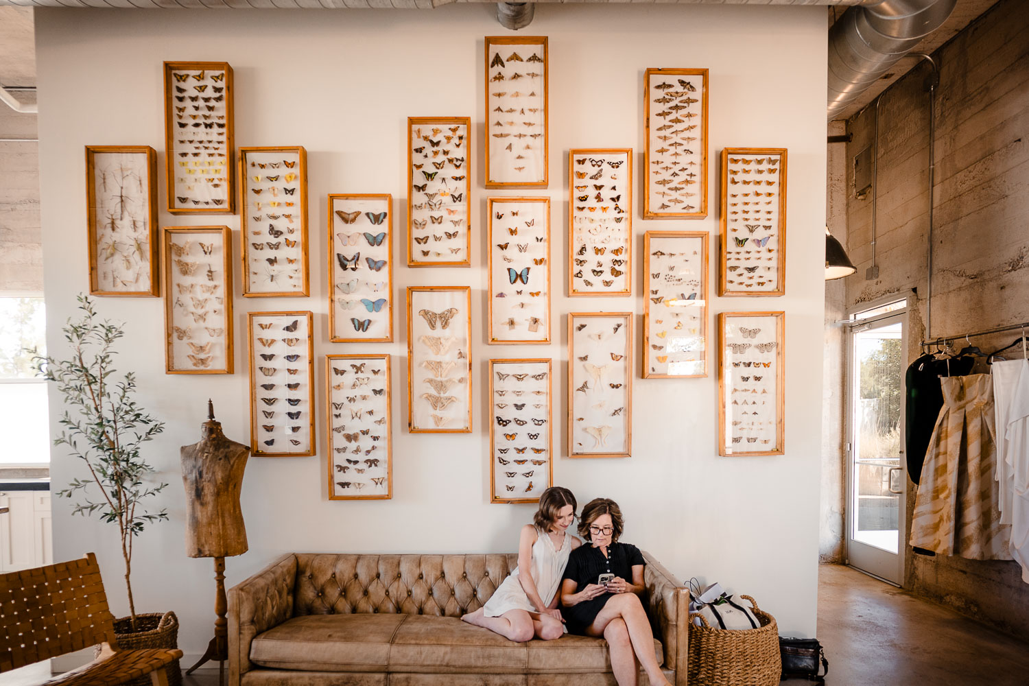 Ice Plant Bldg Wedding | La Grange | Zoe+Patrick 4 Two people sitting on a couch.