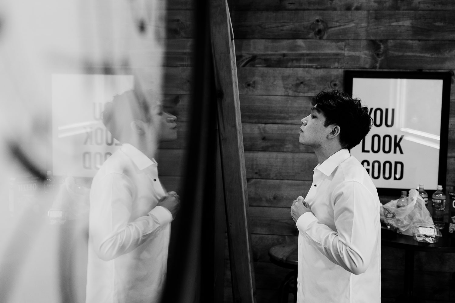 Ice Plant Bldg Wedding | La Grange | Zoe+Patrick 8 Groom adjusting shirt before ceremony.