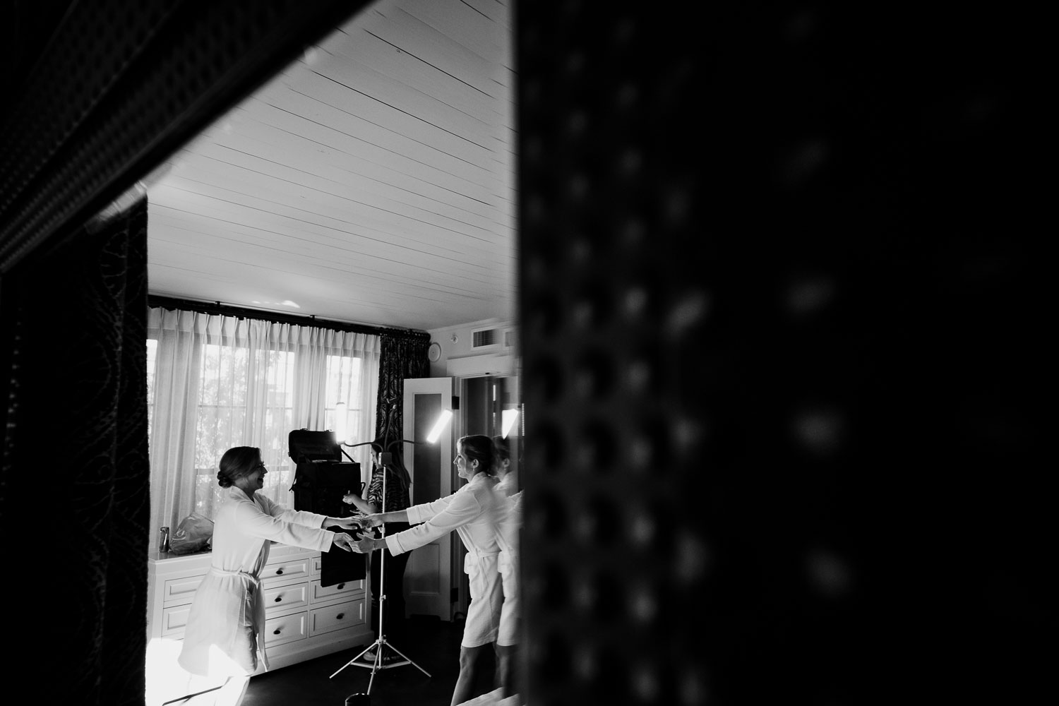 Botanical Gardens San Antonio Wedding Ceremony + Reception 16 Two people interacting in a room.