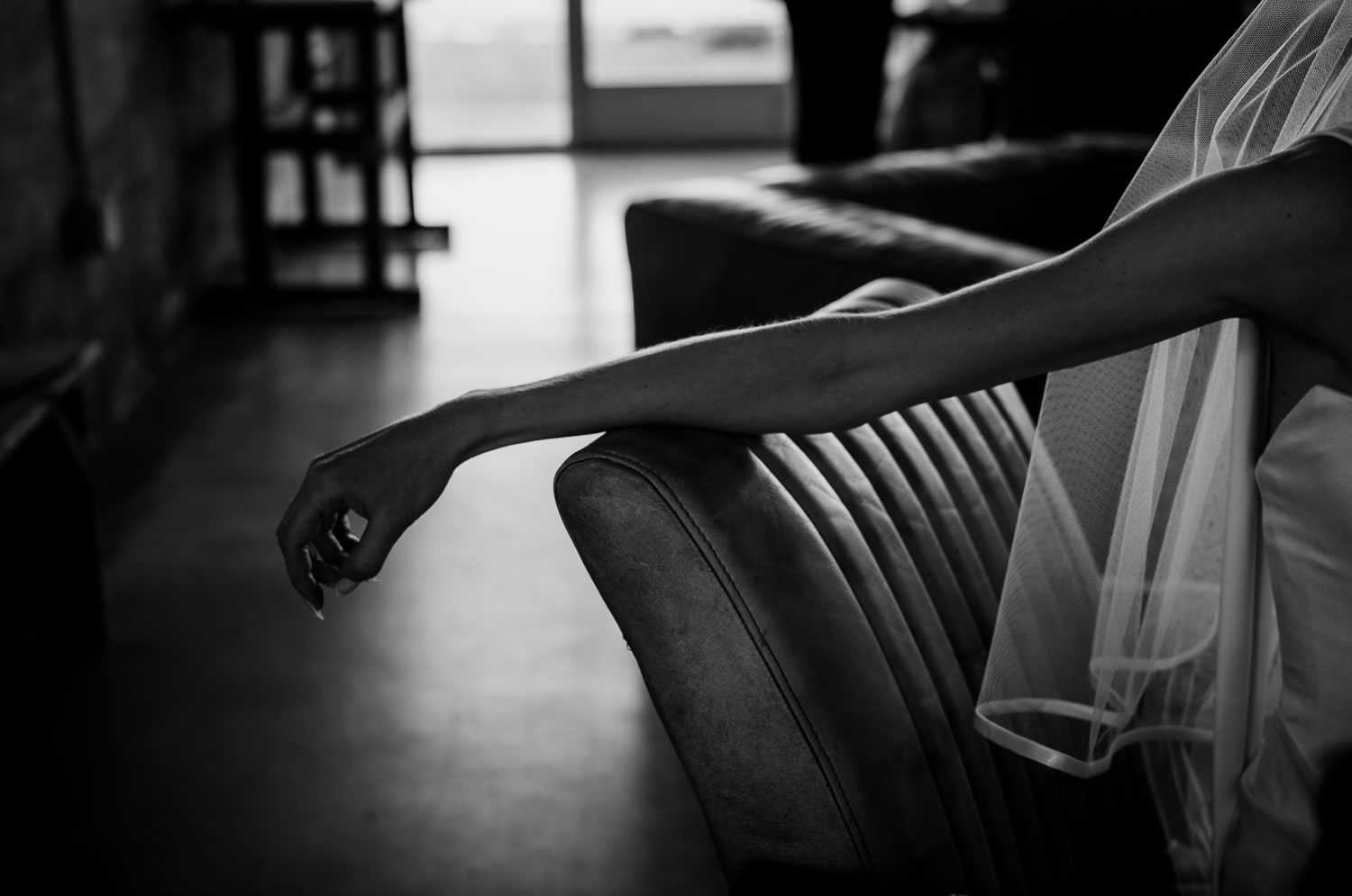 Ice Plant Bldg Wedding | La Grange | Zoe+Patrick 16 Bride's hand resting on couch