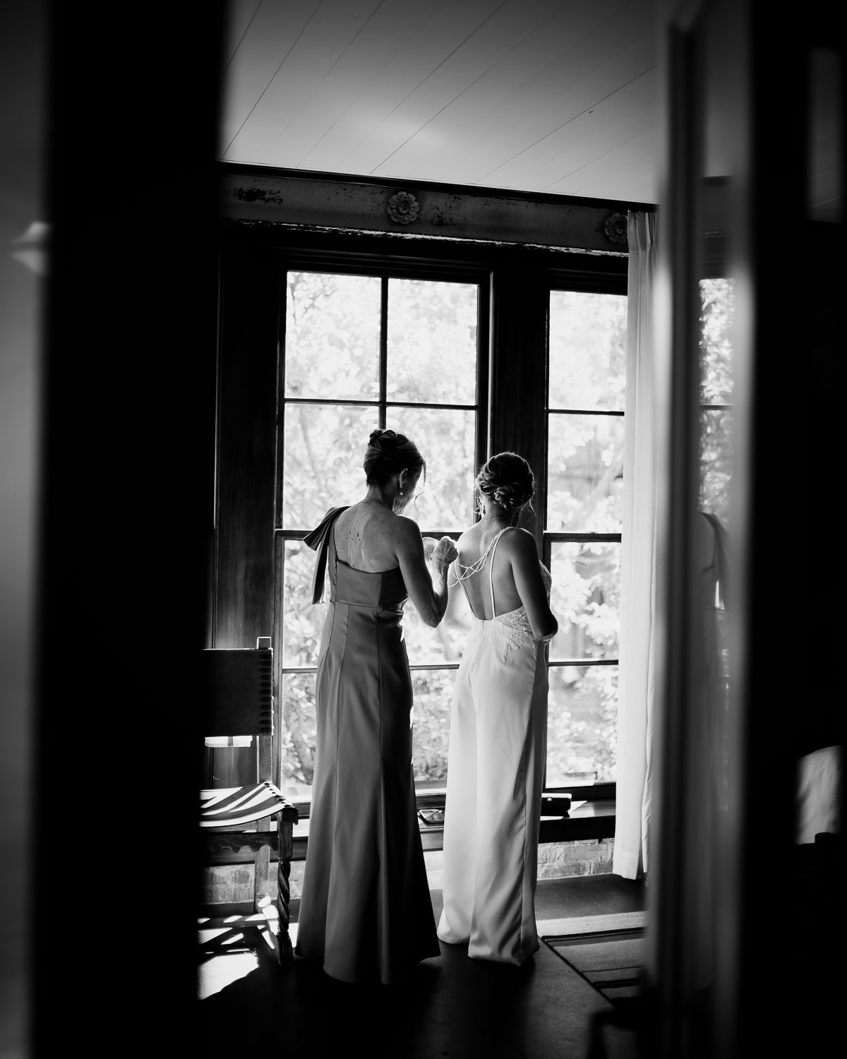 Botanical Gardens San Antonio Wedding Ceremony + Reception 18 Bridesmaids preparing by the window.
