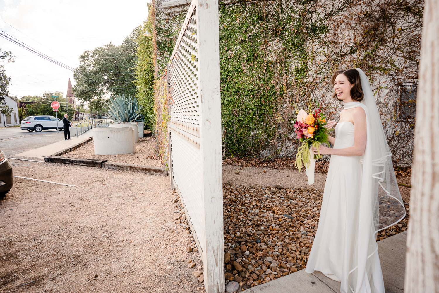 Ice Plant Bldg Wedding | La Grange | Zoe+Patrick 24 Bride holding bouquet near venue