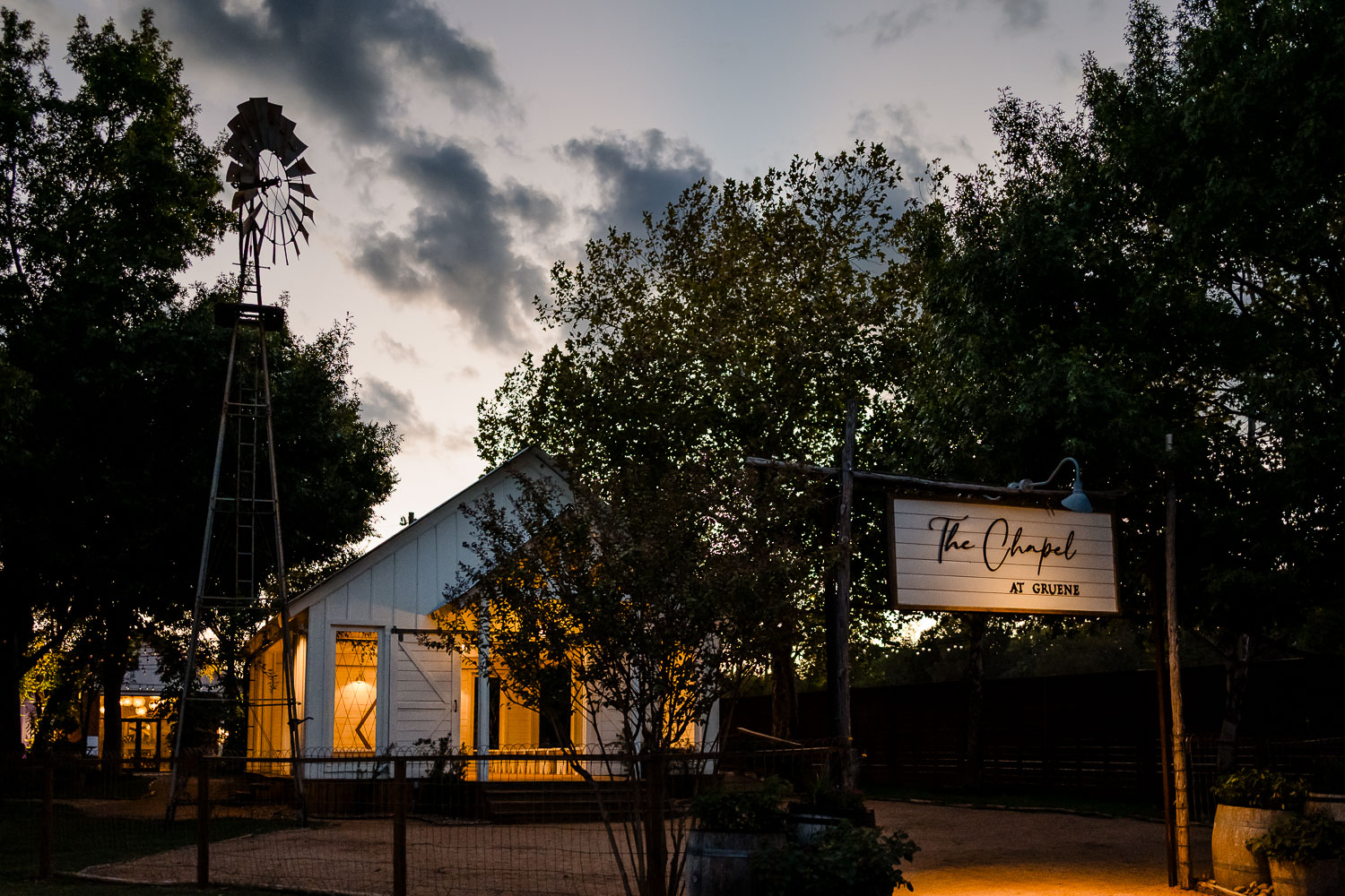 Charming chapel at dusk with trees