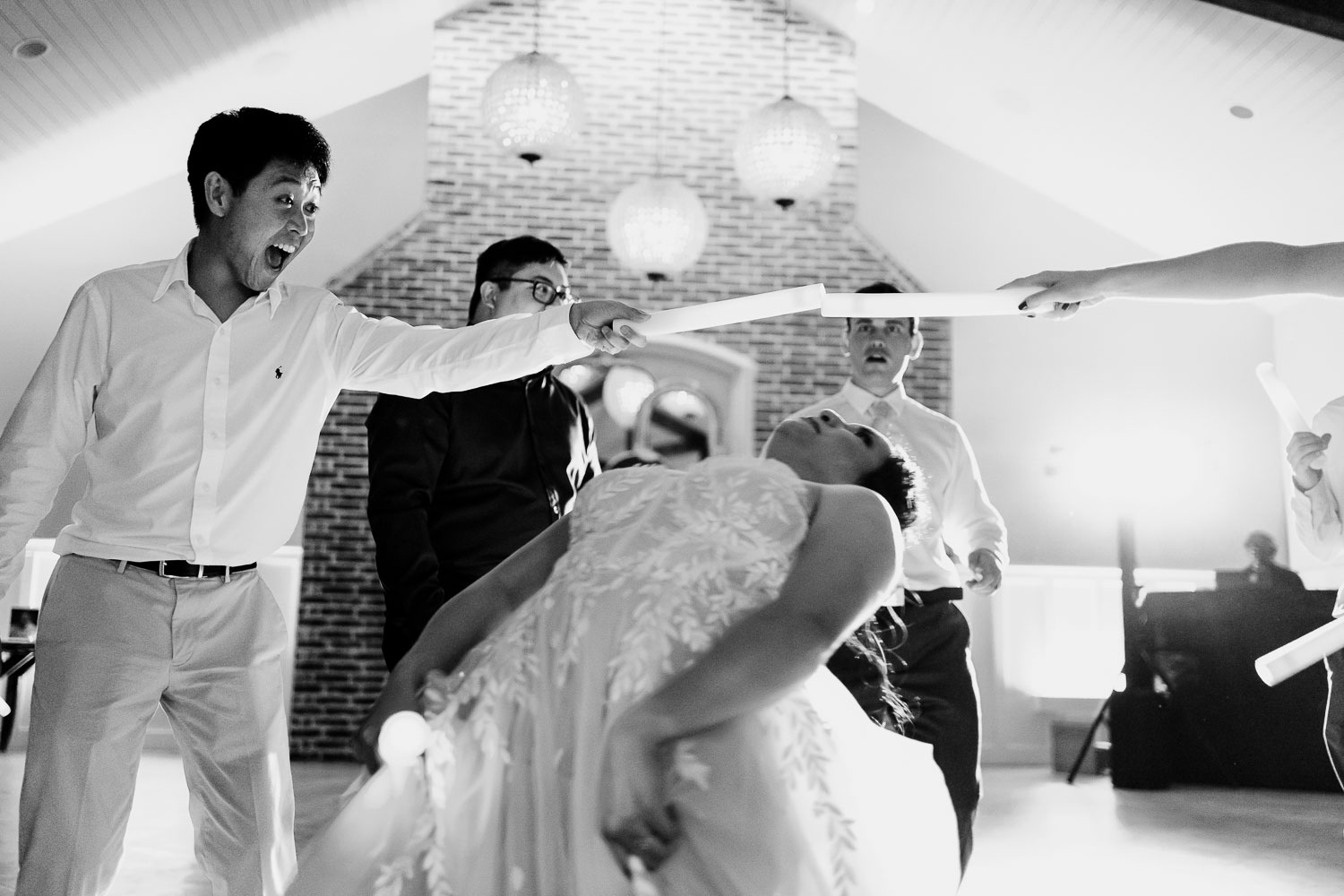Celebration dance at wedding reception.