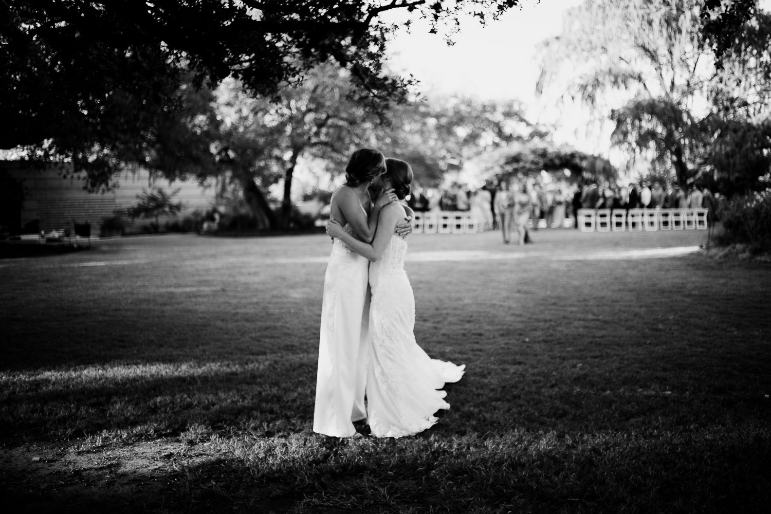 Wedding guests in a garden setting.