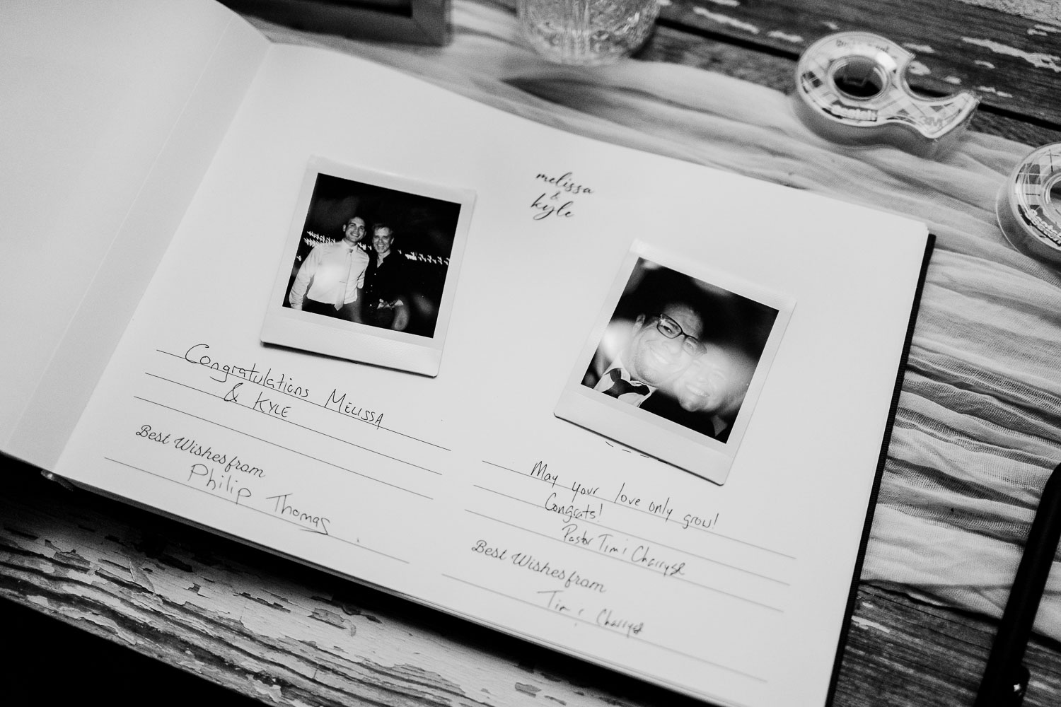 Wedding guestbook with polaroid photos.