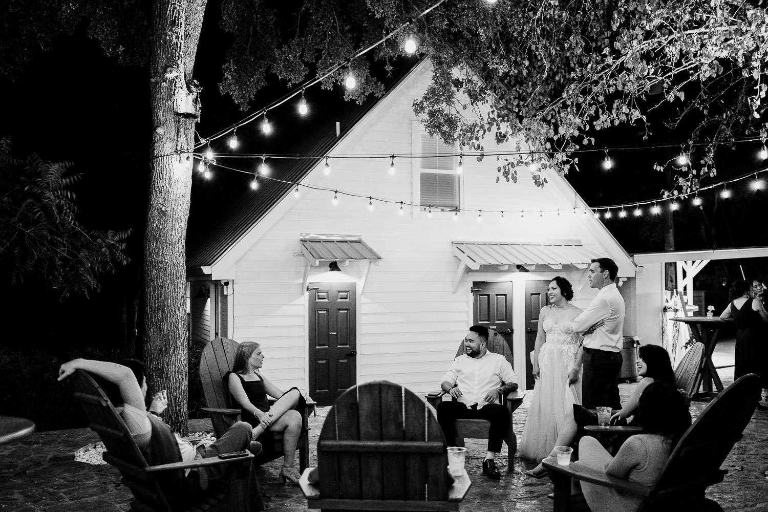 Couple dancing in elegant reception venue.