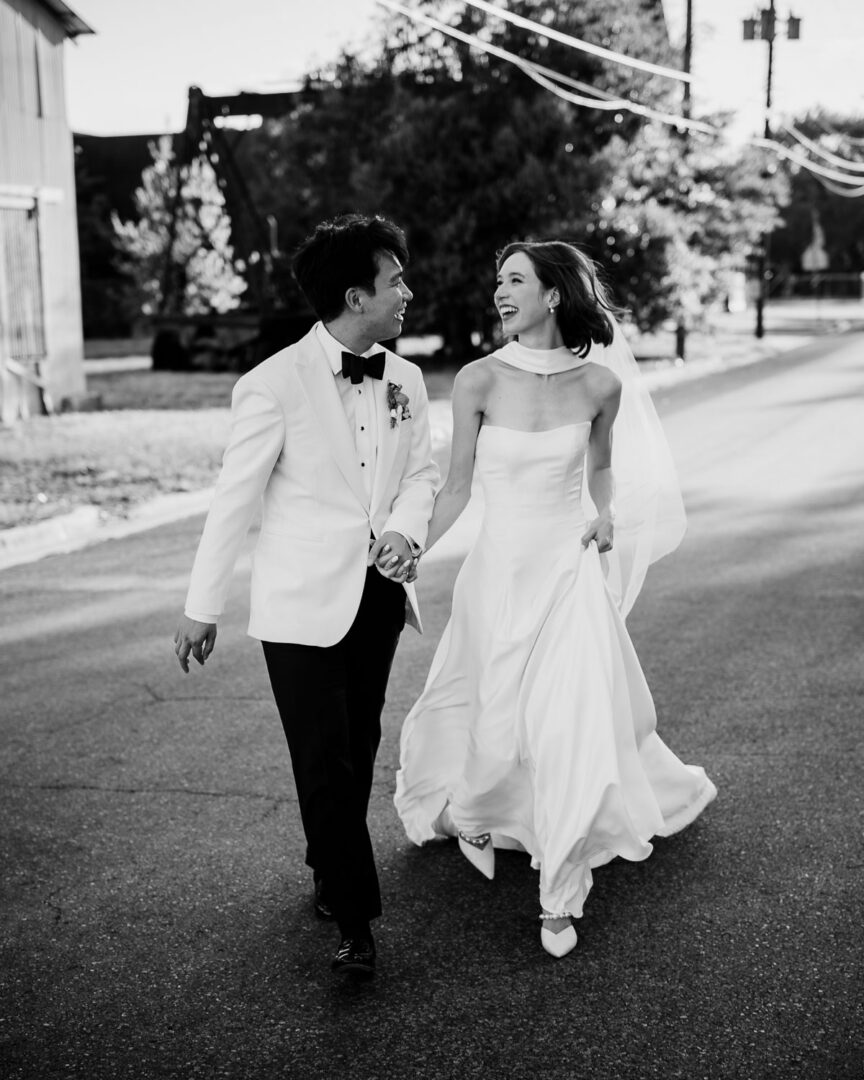 Ice Plant Bldg Wedding | La Grange | Zoe+Patrick 43 Elegant couple in wedding attire outdoors.