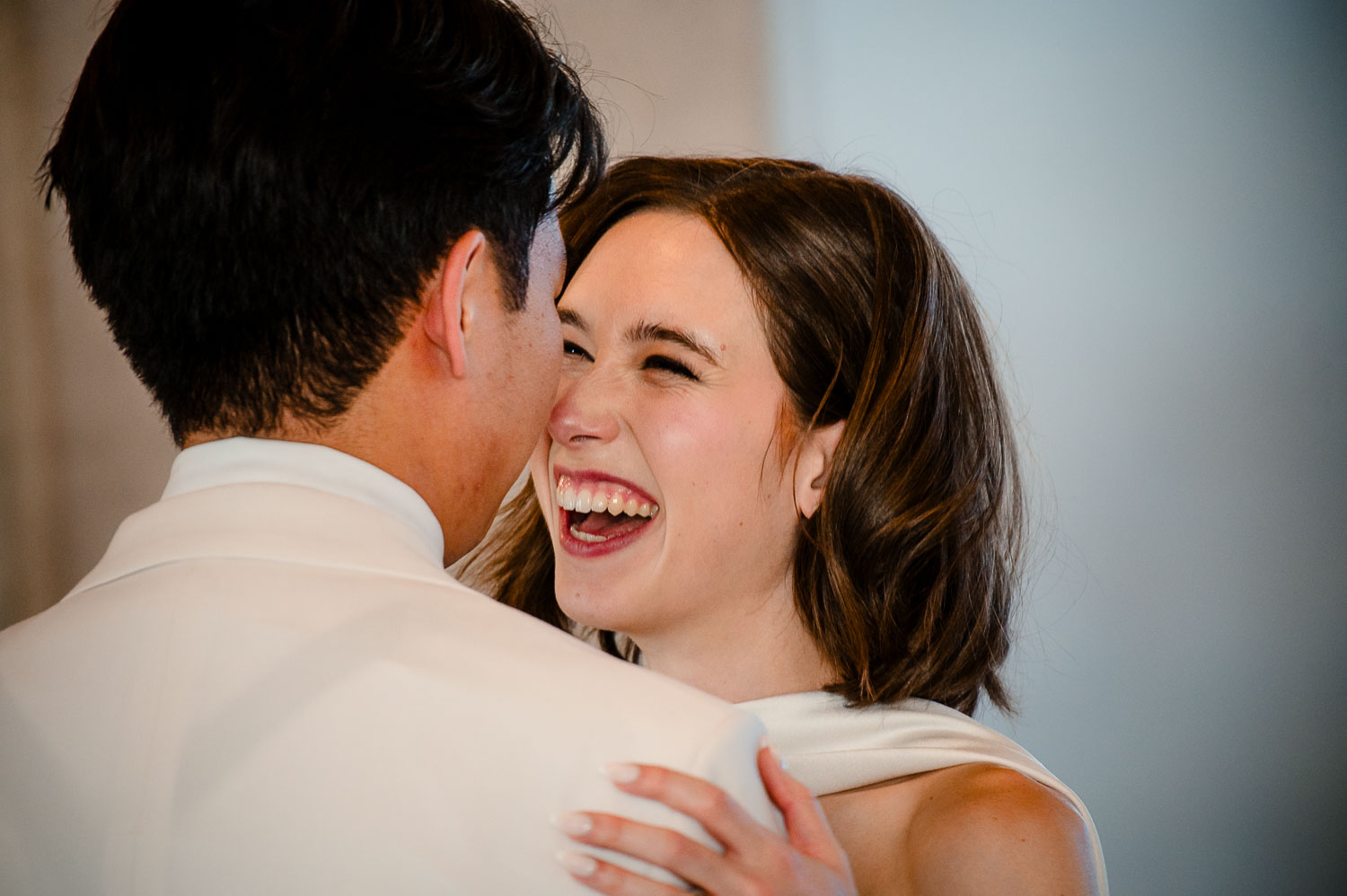 Ice Plant Bldg Wedding | La Grange | Zoe+Patrick 46 Couple sharing a romantic moment outdoors.