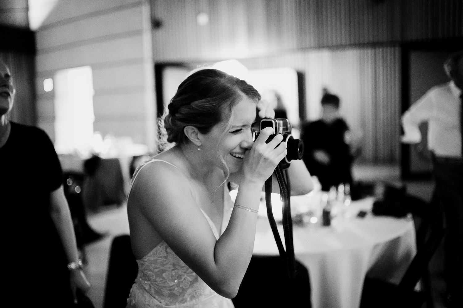 Botanical Gardens San Antonio Wedding Ceremony + Reception 58 Woman photographing at wedding reception.