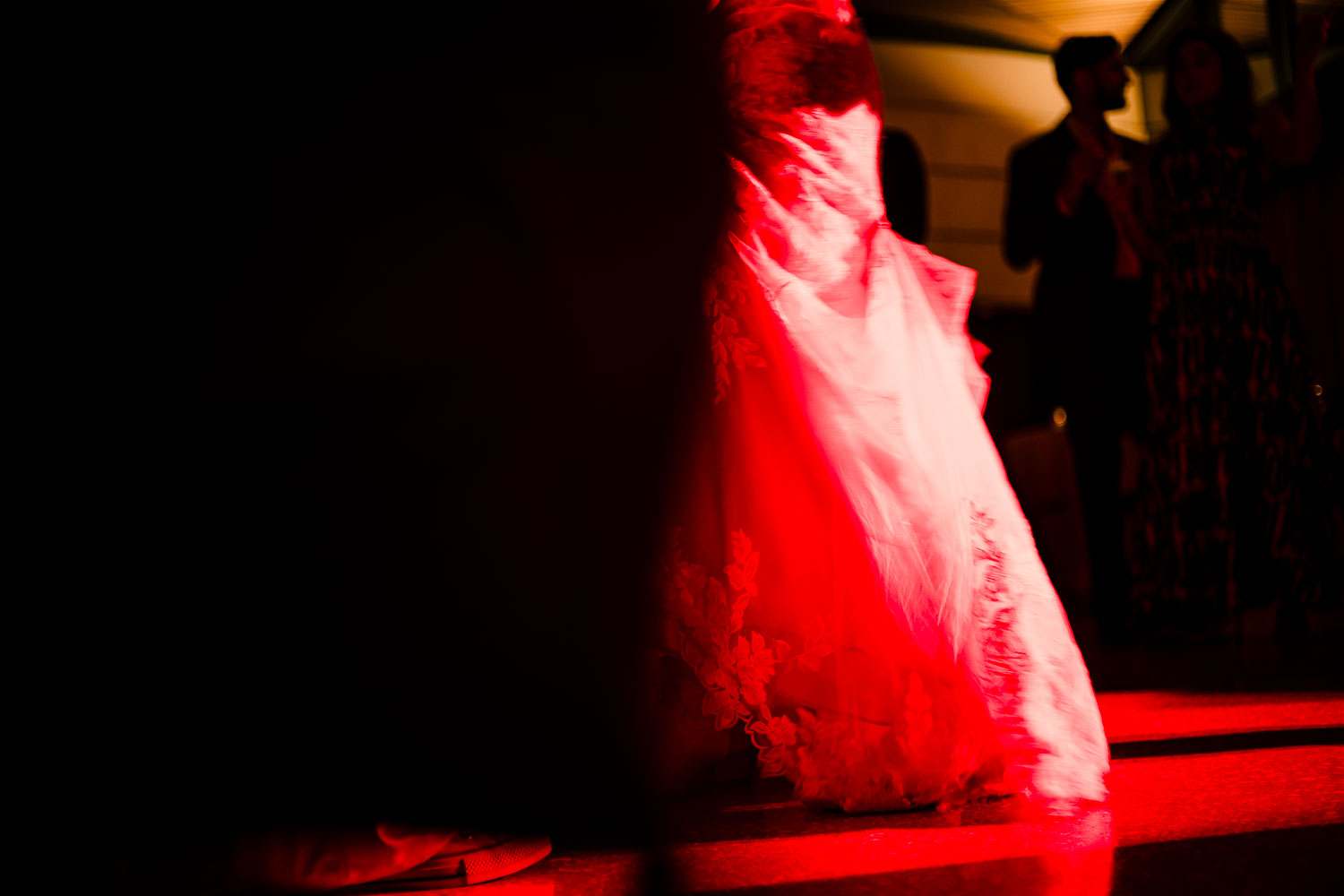 Botanical Gardens San Antonio Wedding Ceremony + Reception 60 Red wedding dress in dim lighting.