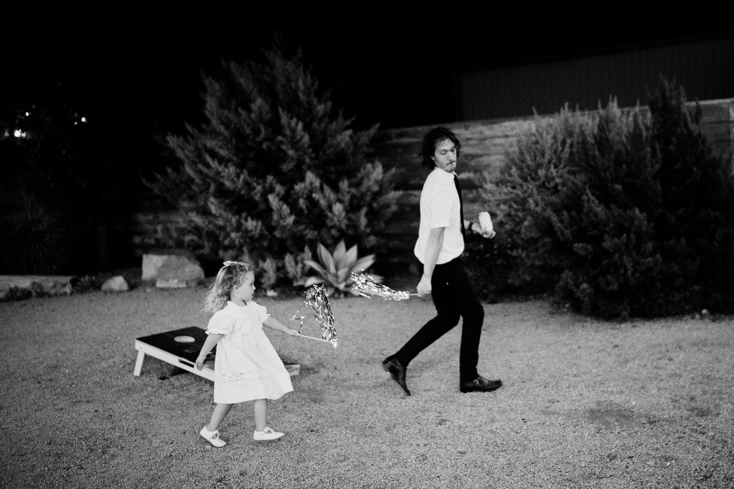 Ice Plant Bldg Wedding | La Grange | Zoe+Patrick 74 Child playing while adult walks away