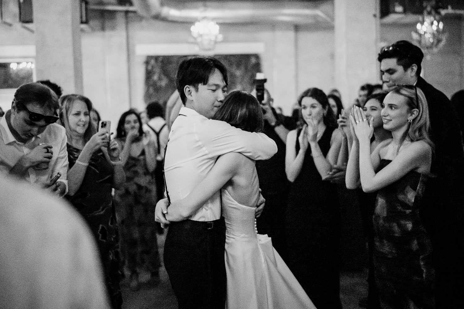 Ice Plant Bldg Wedding | La Grange | Zoe+Patrick 76 Couple dancing surrounded by guests.