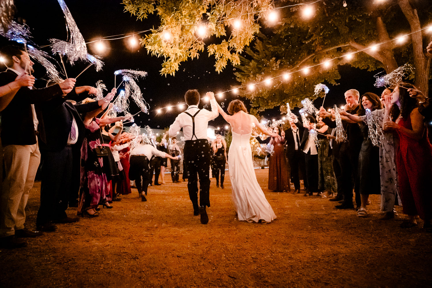 Ice Plant Bldg Wedding | La Grange | Zoe+Patrick 81 Couple exits wedding under sparklers.