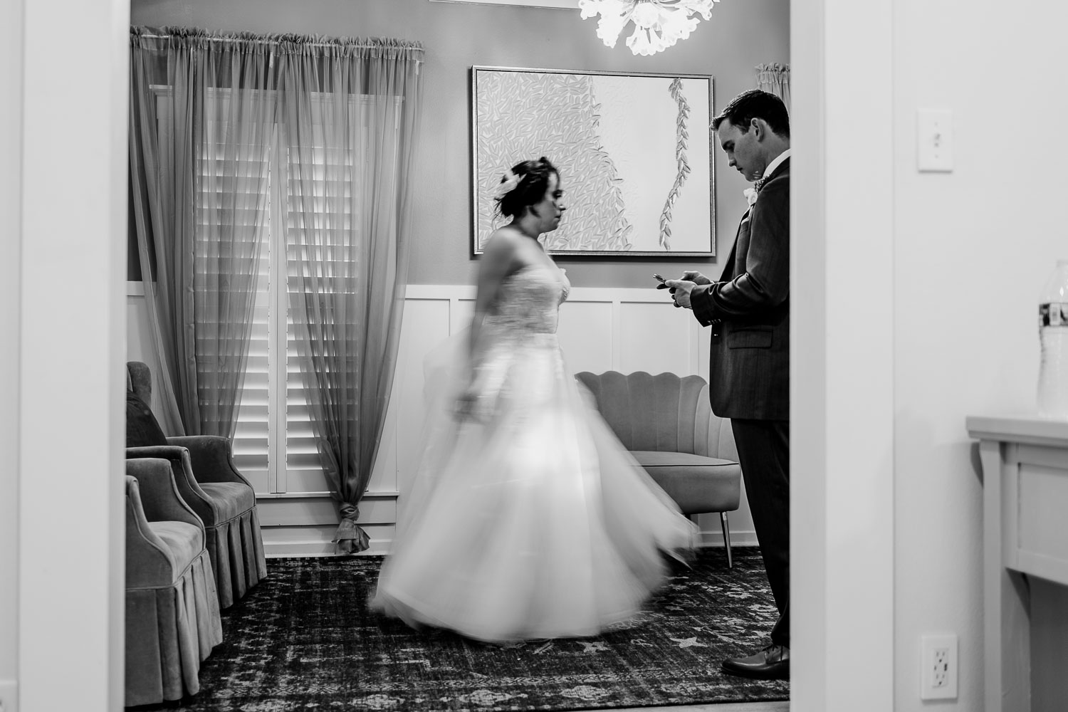 Bride and groom in elegant setting.