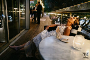 Houston wedding photographer - Fearless Award - October 2025 - Bride takes a break