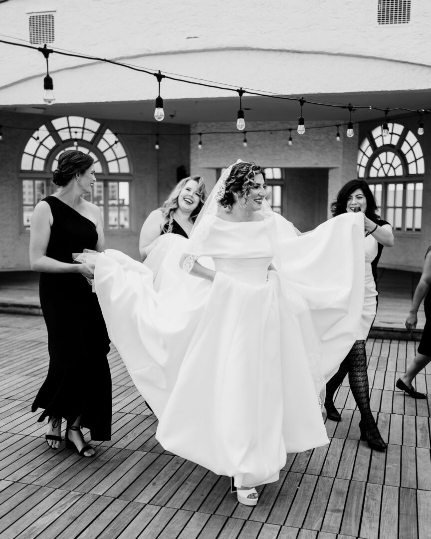 Bride in elegant white dress.