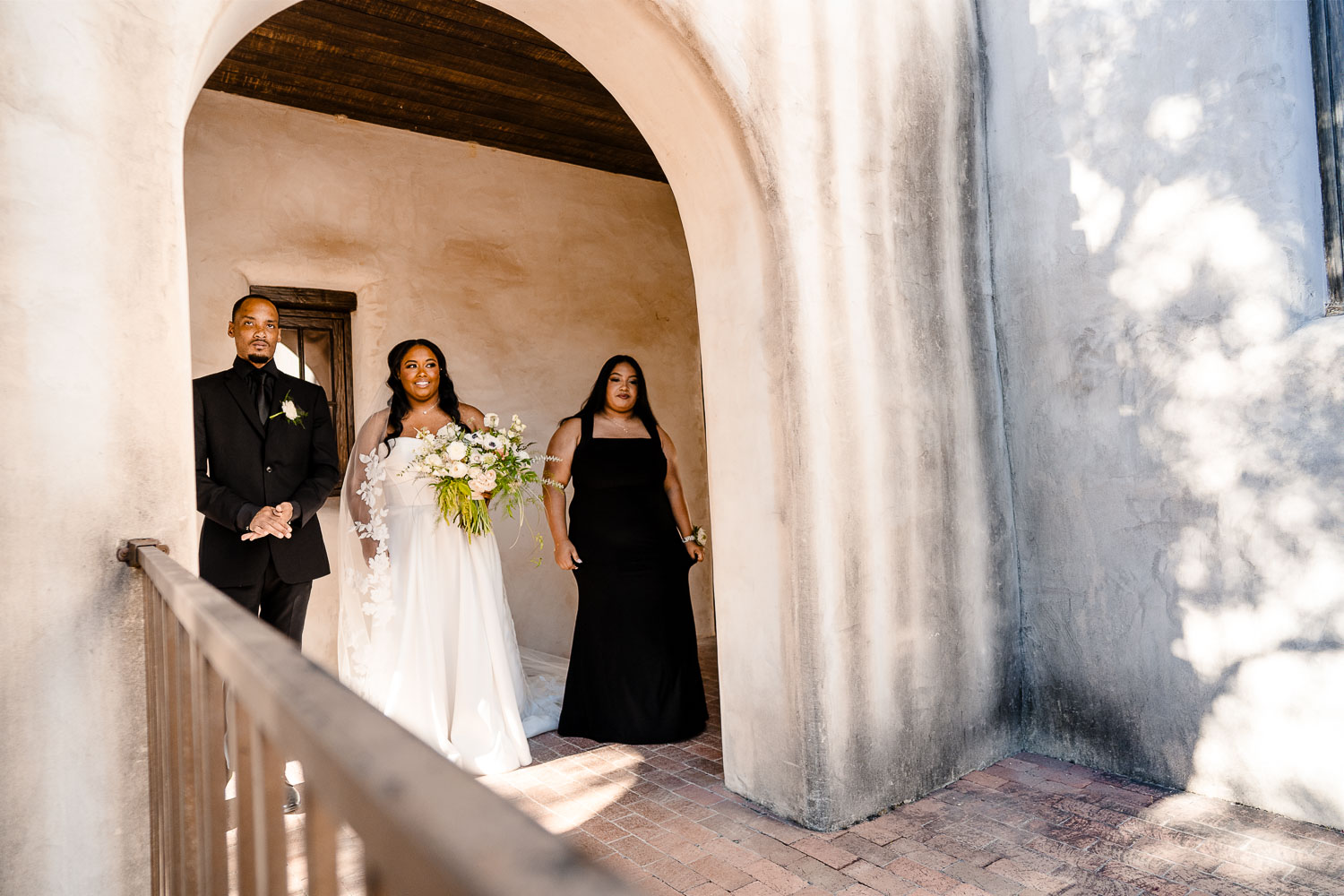 Lost Mission Wedding Ceremony + Reception | Peyge + Luis 16 A bride waits with her brother and sister prior to the wedding ceremony