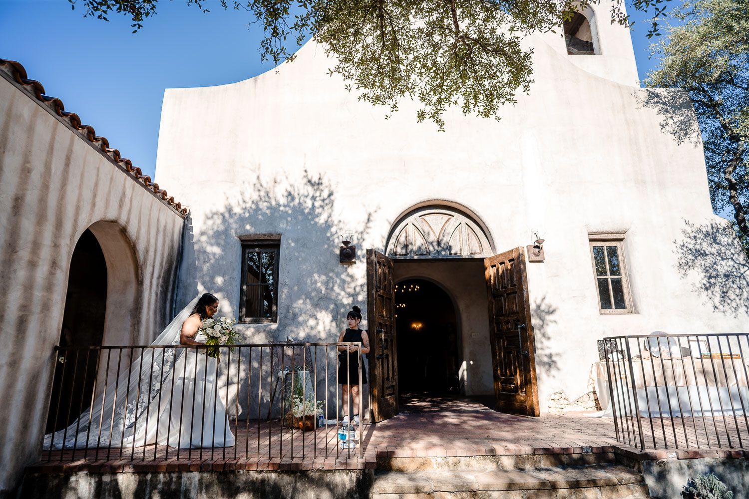 Lost Mission Wedding Ceremony + Reception | Peyge + Luis 17 A wide shot of bride entering the chapel