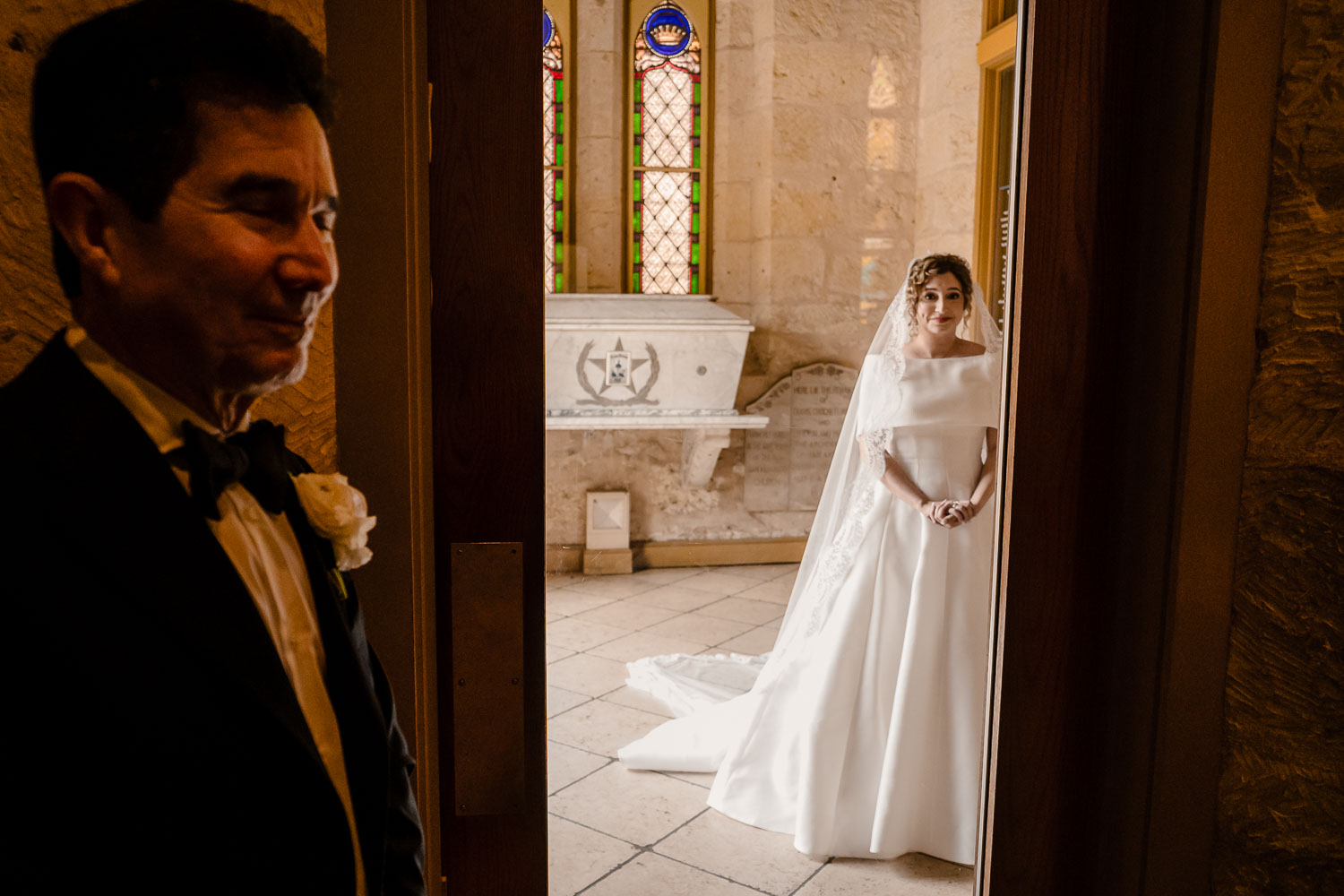 Bride in elegant wedding dress waiting.