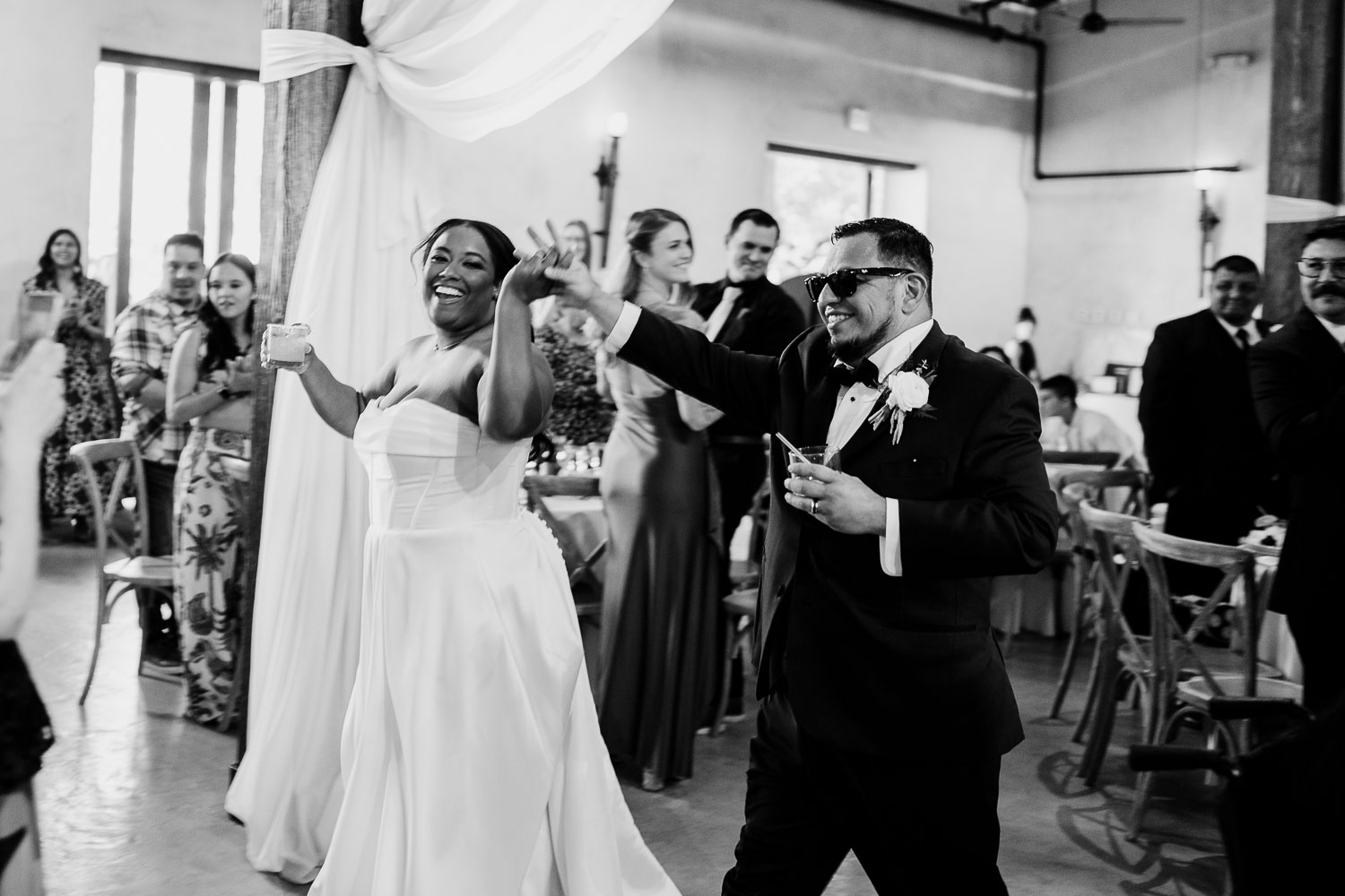 Lost Mission Wedding Ceremony + Reception | Peyge + Luis 37 Peyge and Luis make their reception entrance at Lost Mission, San Antonio, Texas