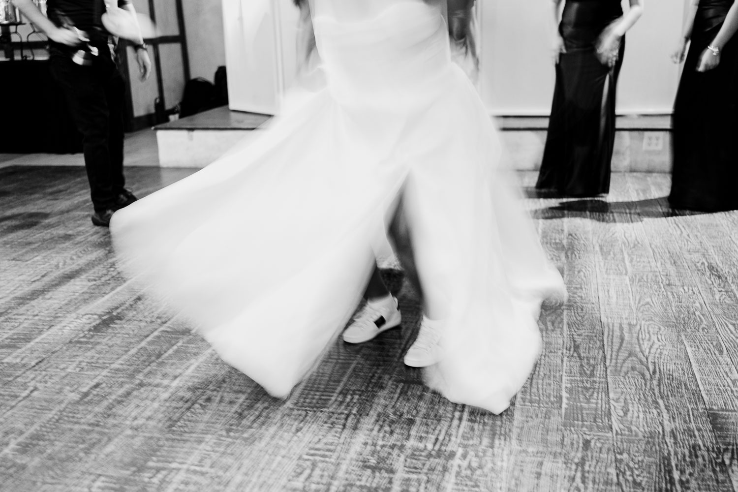 Lost Mission Wedding Ceremony + Reception | Peyge + Luis 51 Dragged shutter bride dancing shows her sneakers - Dragged shutter bride dancing