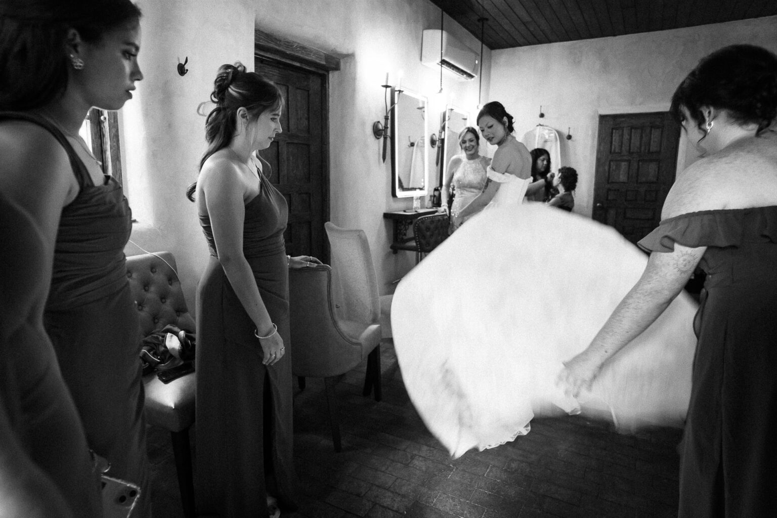 Bridesmaids preparing for the wedding.
