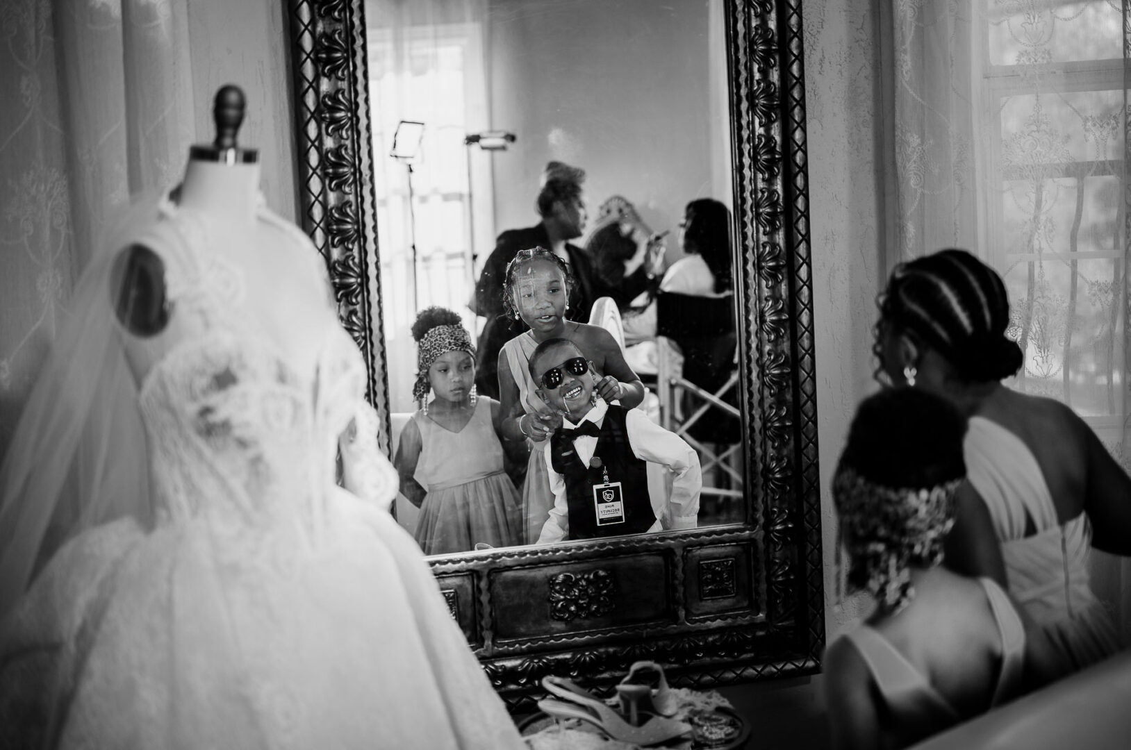 The Springs Weddings & Events | Candice + Larry 13 Person ascending ornate staircase in black-and-white