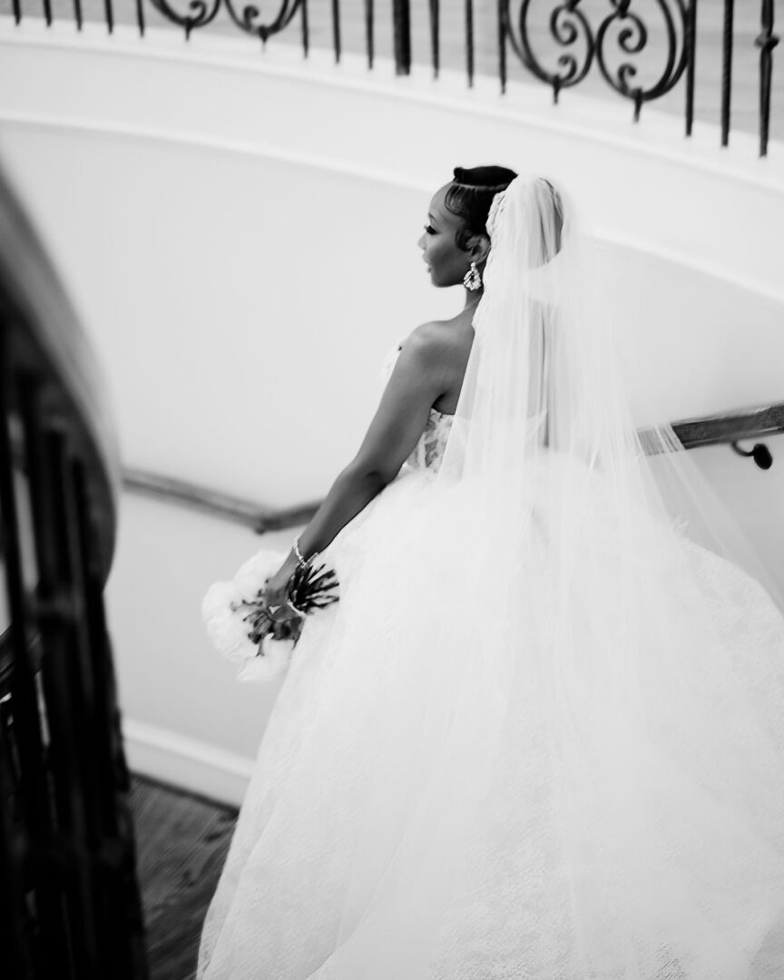 The Springs Weddings & Events | Candice + Larry 18 Lush greenery framing a distant figure.