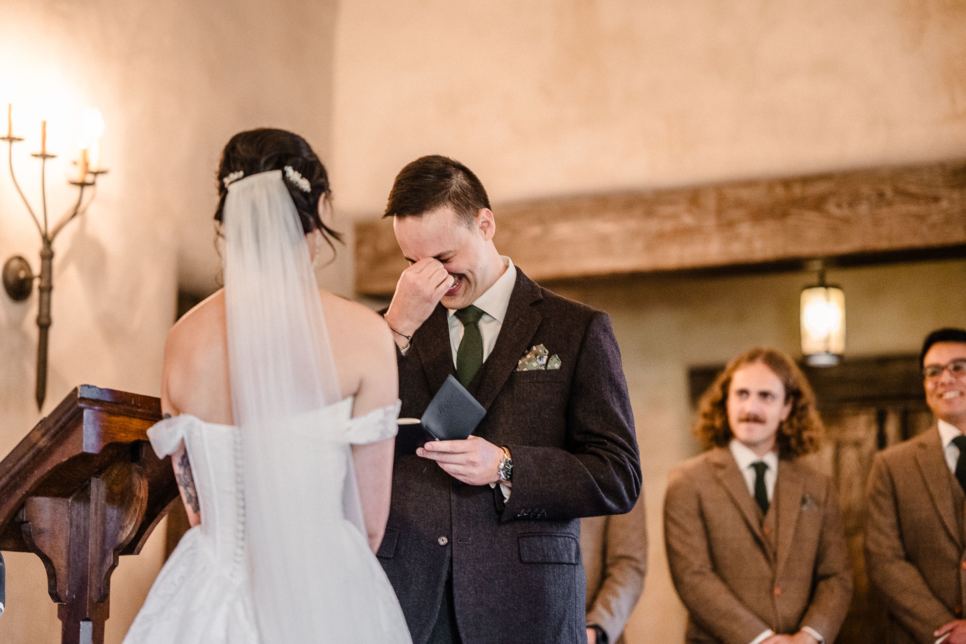 Couple exchanging vows in chapel.