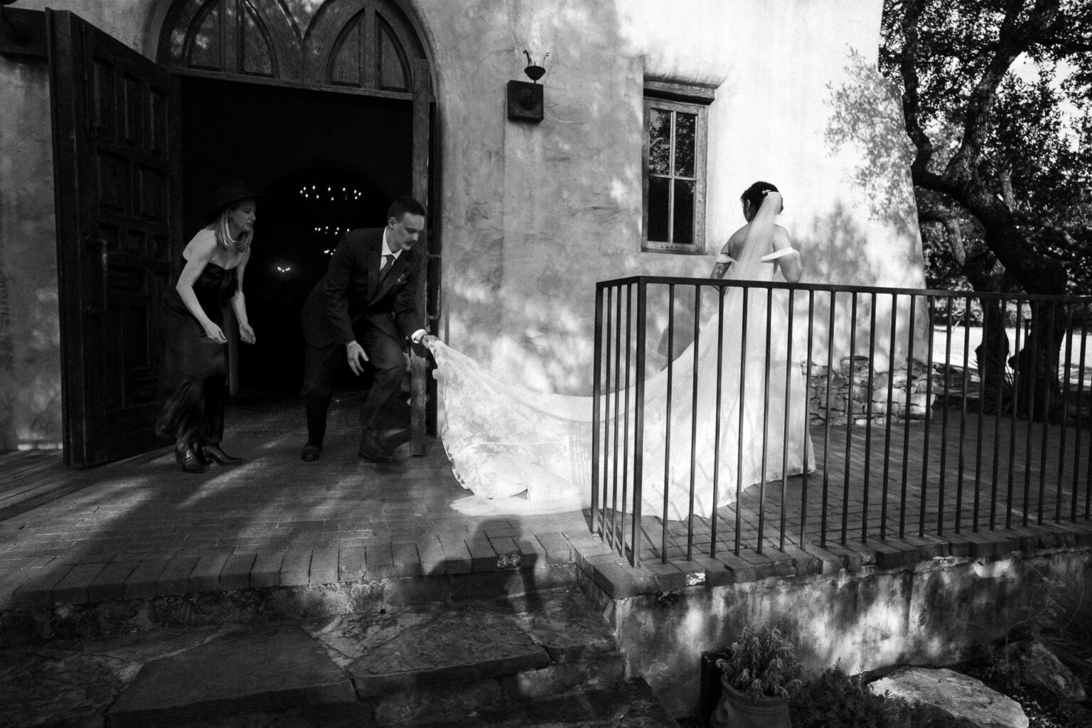 Bride entering venue with assistance.