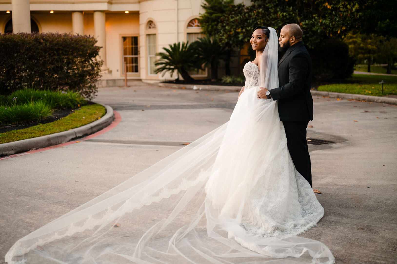 The Springs Weddings & Events | Candice + Larry 35 Bride holding elegant wedding dress