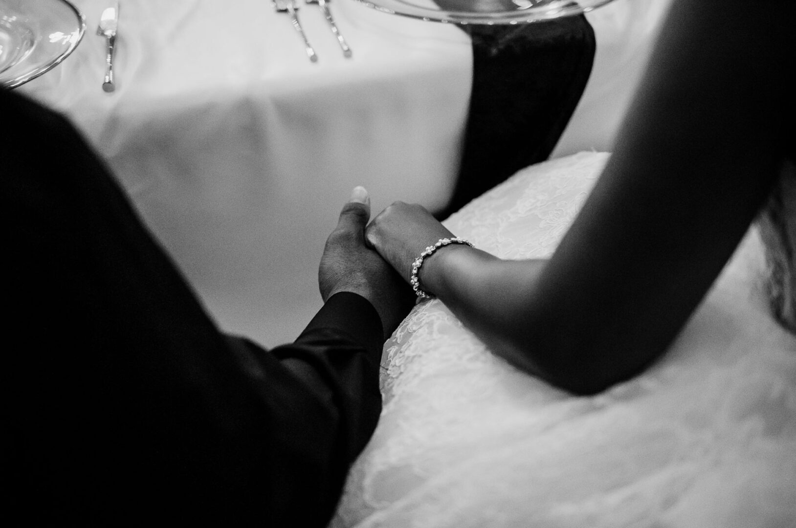 Elegant wedding reception with dancing guests.