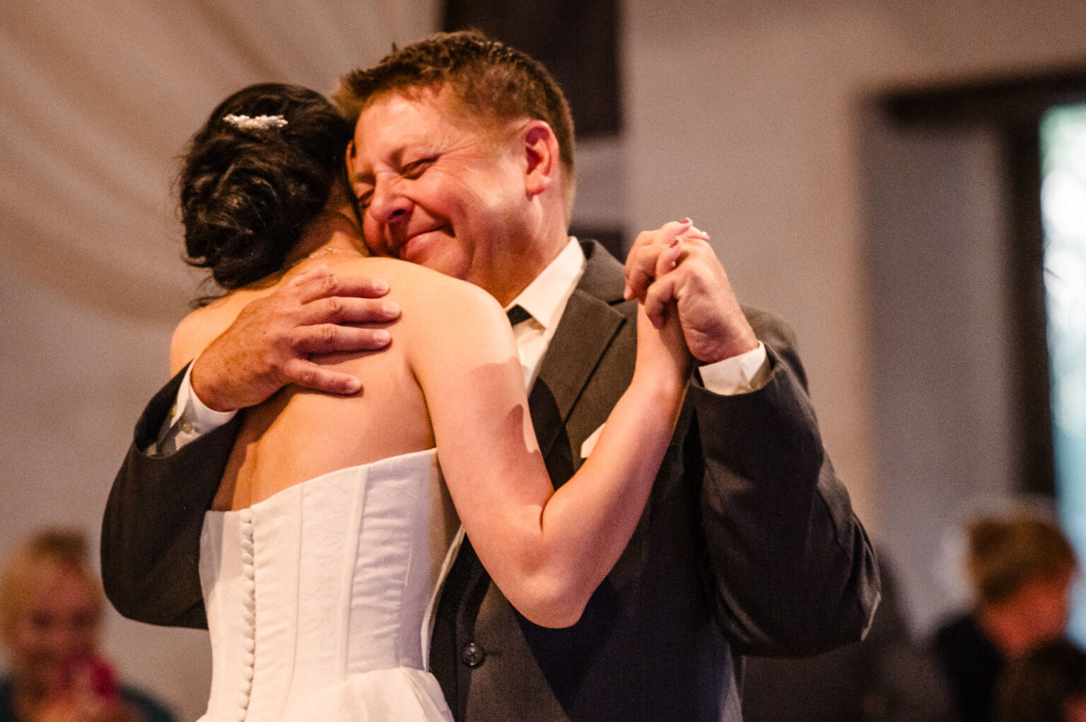 Couple dancing at wedding ceremony.