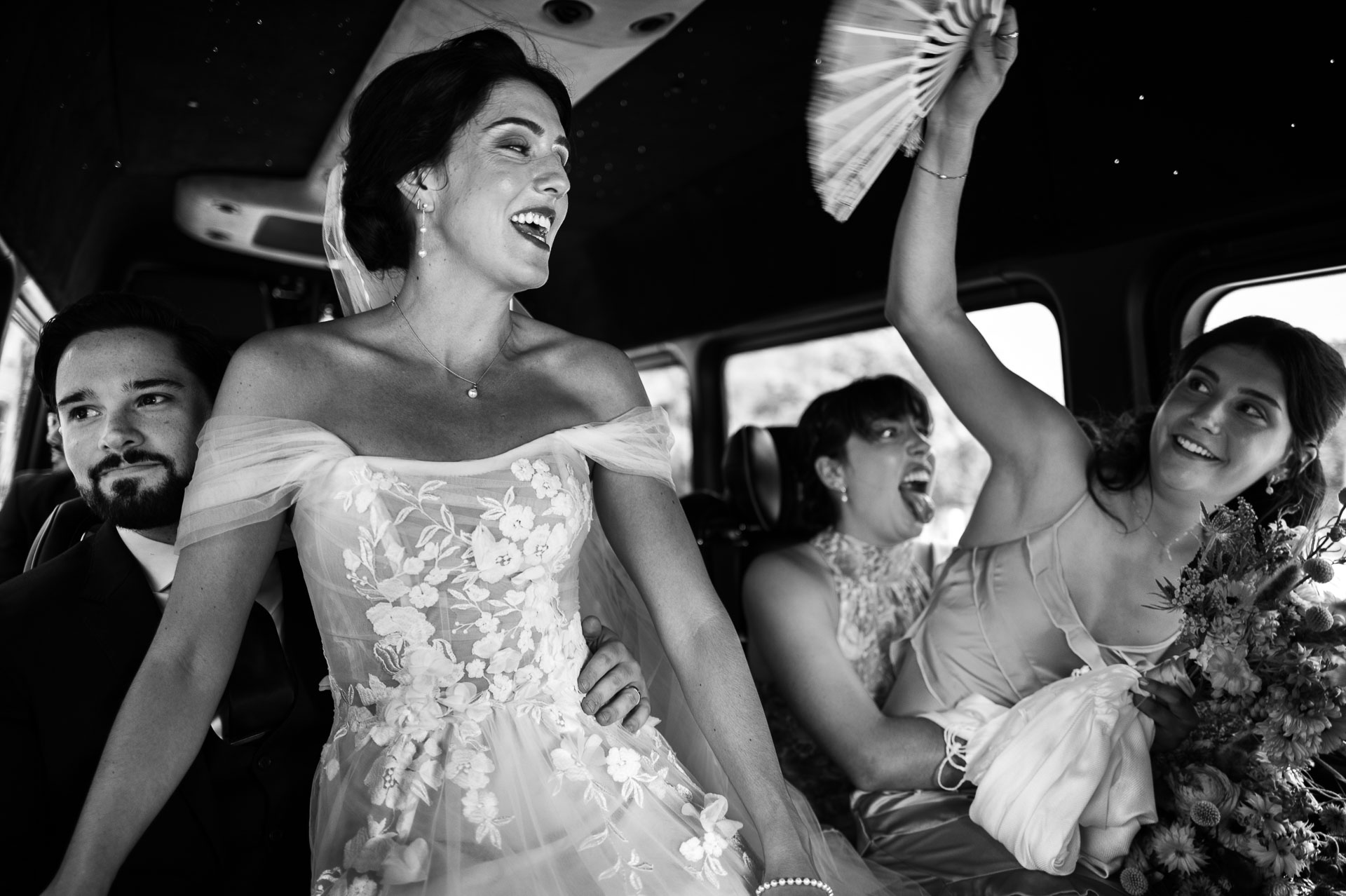 Bride rides in limo with husband and family