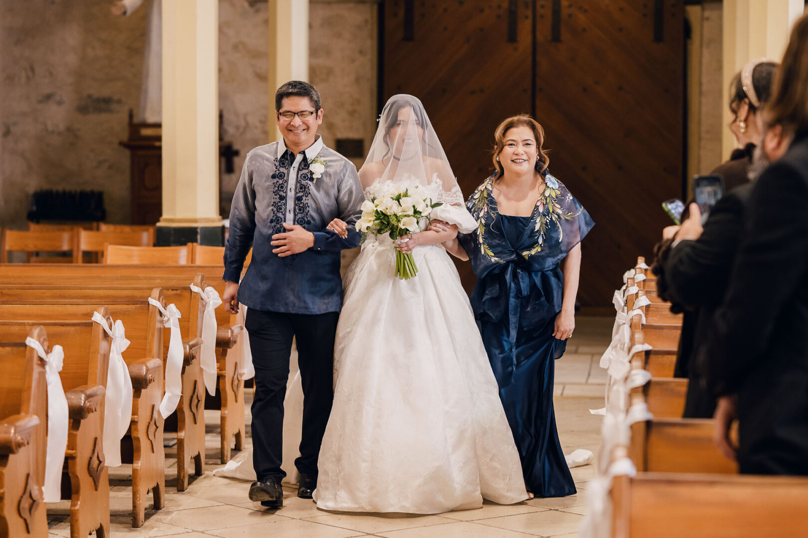 Noreena & Robert's Elegant Wedding at San Fernando Cathedral 20 Bride walking down the aisle