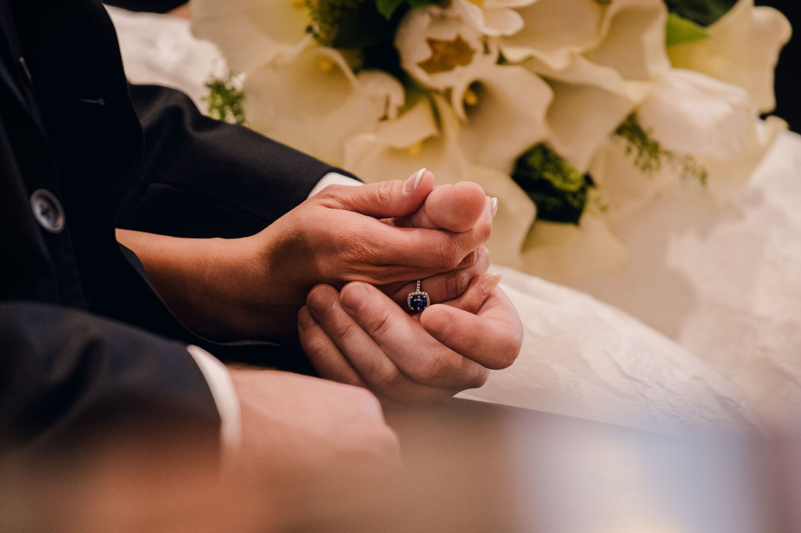 Noreena & Robert's Elegant Wedding at San Fernando Cathedral 27 Couple holding hands during ceremony