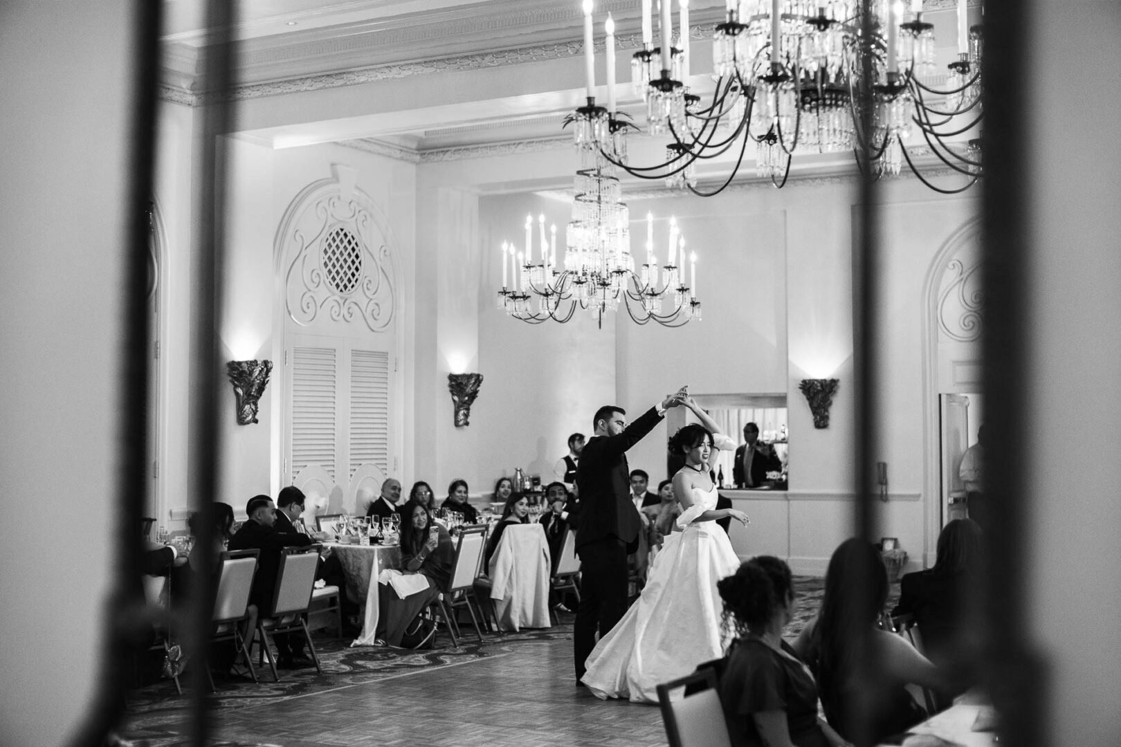 Noreena & Robert's Elegant Wedding at San Fernando Cathedral 55 Elegant wedding reception with dancing couple.