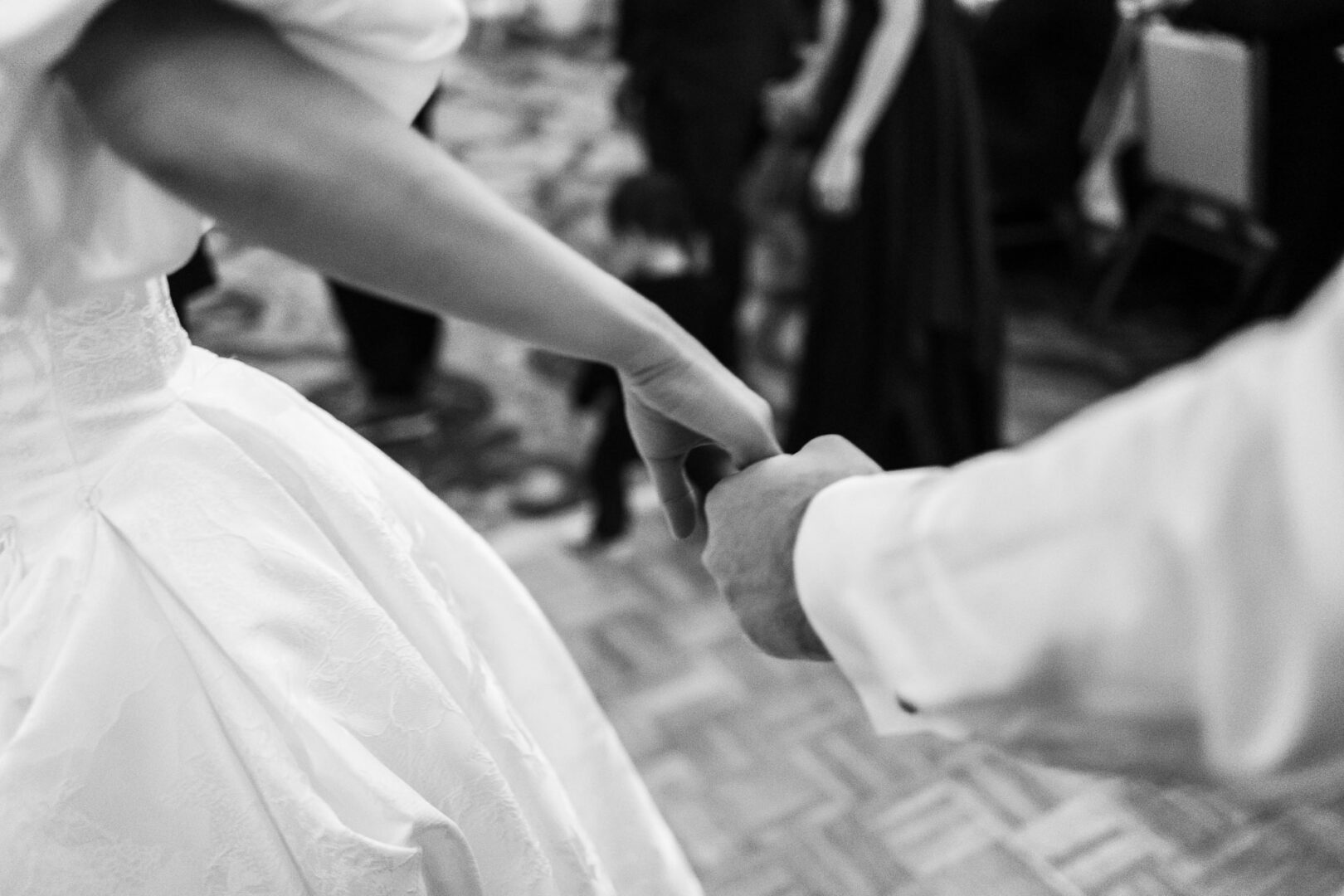 Noreena & Robert's Elegant Wedding at San Fernando Cathedral 59 Couple holding hands at wedding