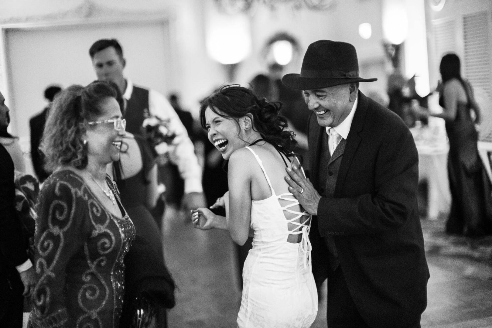 Noreena & Robert's Elegant Wedding at San Fernando Cathedral 62 Dancing at a wedding reception.