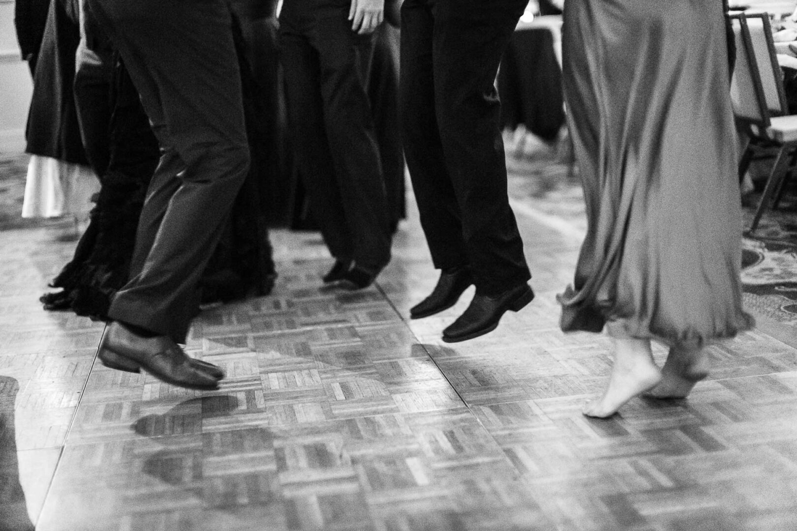 Noreena & Robert's Elegant Wedding at San Fernando Cathedral 64 People dancing on a wooden floor.