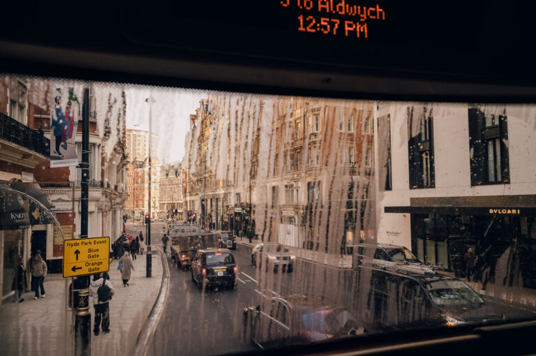 A view from a double decker bus passing Bvlgari Hotel London in January 2026