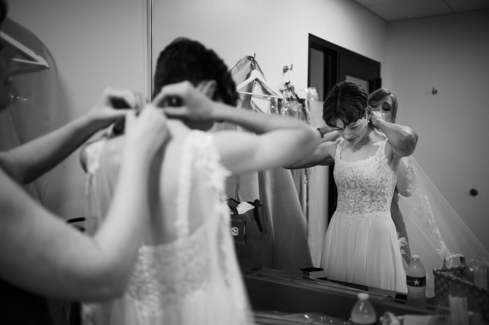 Winter Wedding at Botanical Gardens, San Antonio, Texas 3 Bride getting dressed before ceremony