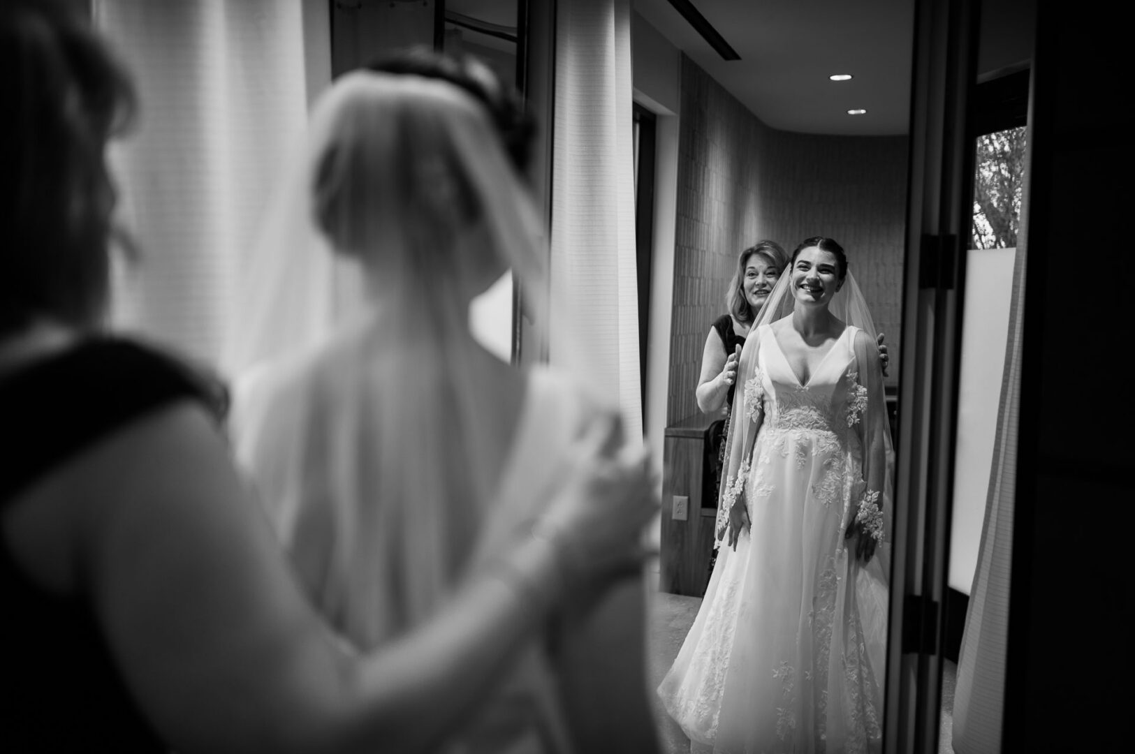 Winter Wedding at Botanical Gardens, San Antonio, Texas 5 Bride preparing with mother in reflection